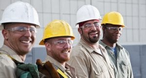 construction workers on site wearing hard hats